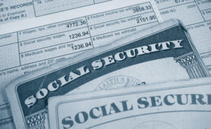 Close up of a tax form and social security cards