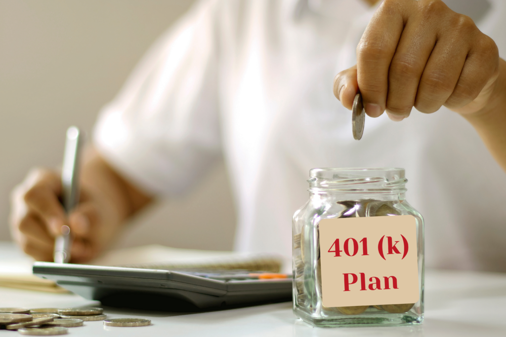 Woman with a notebook and calculator placing a coin into a jar that is labeled "401 (k) Plan"